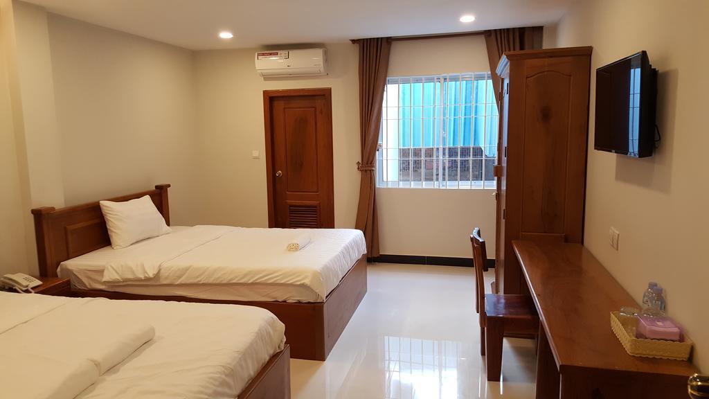 Regal Home Guesthouse Phnom Penh Bagian luar foto
