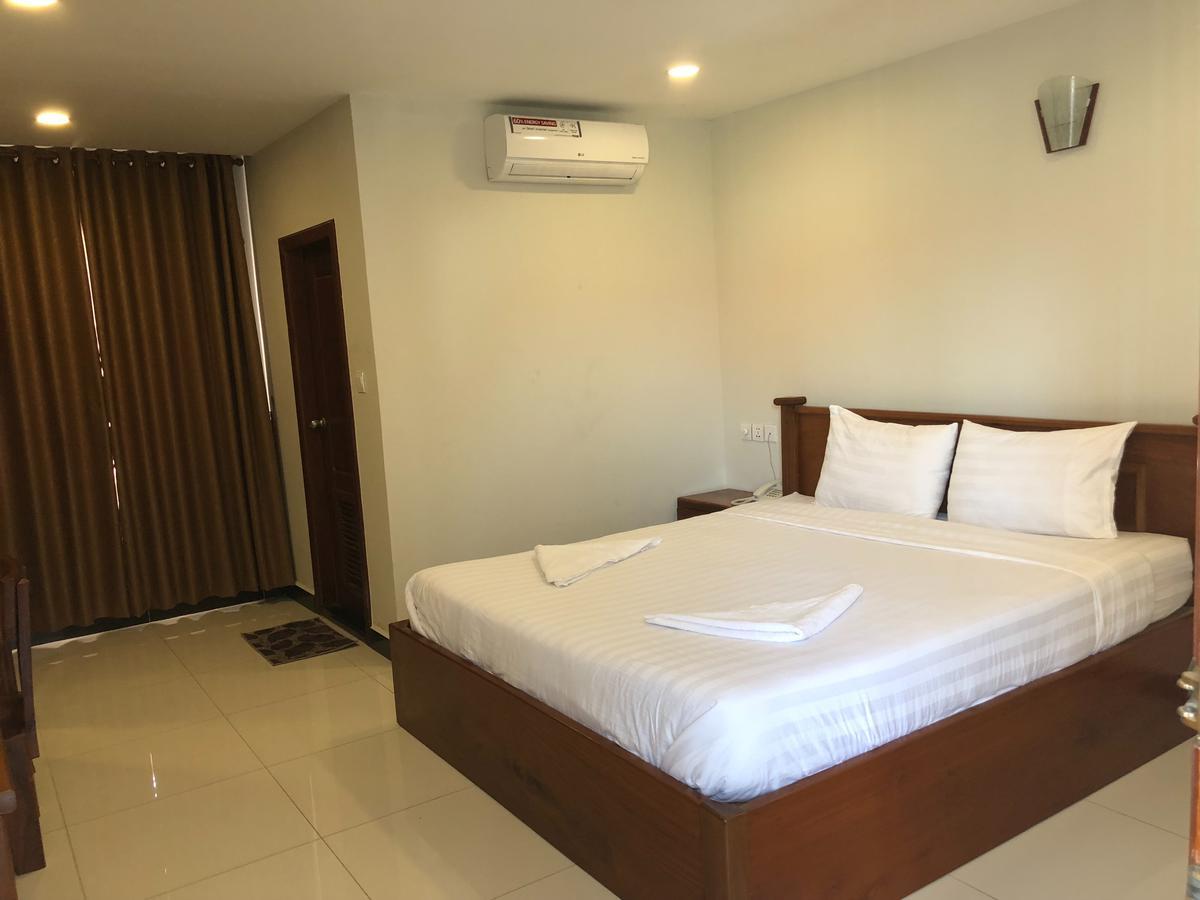 Regal Home Guesthouse Phnom Penh Bagian luar foto